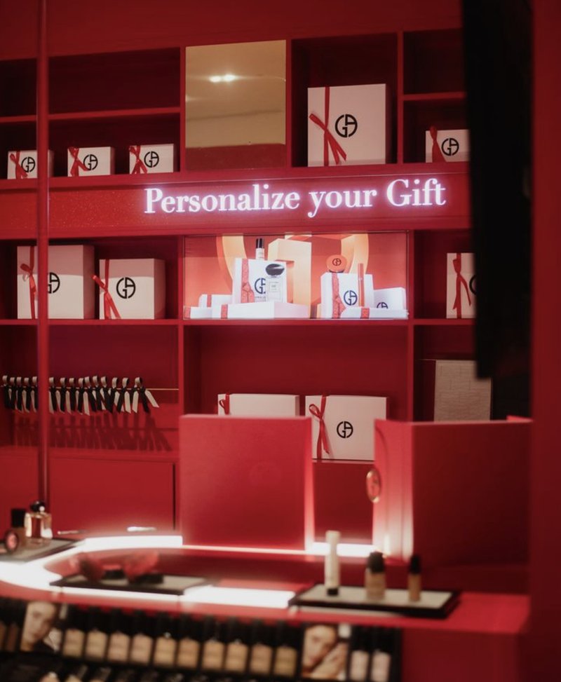 Armani beauty pop-up store personalization counter, reference for the high-end retailer partnership pillar