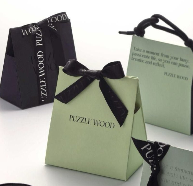 Puzzle Wood sustainable luxury packaging with ribbon detail
